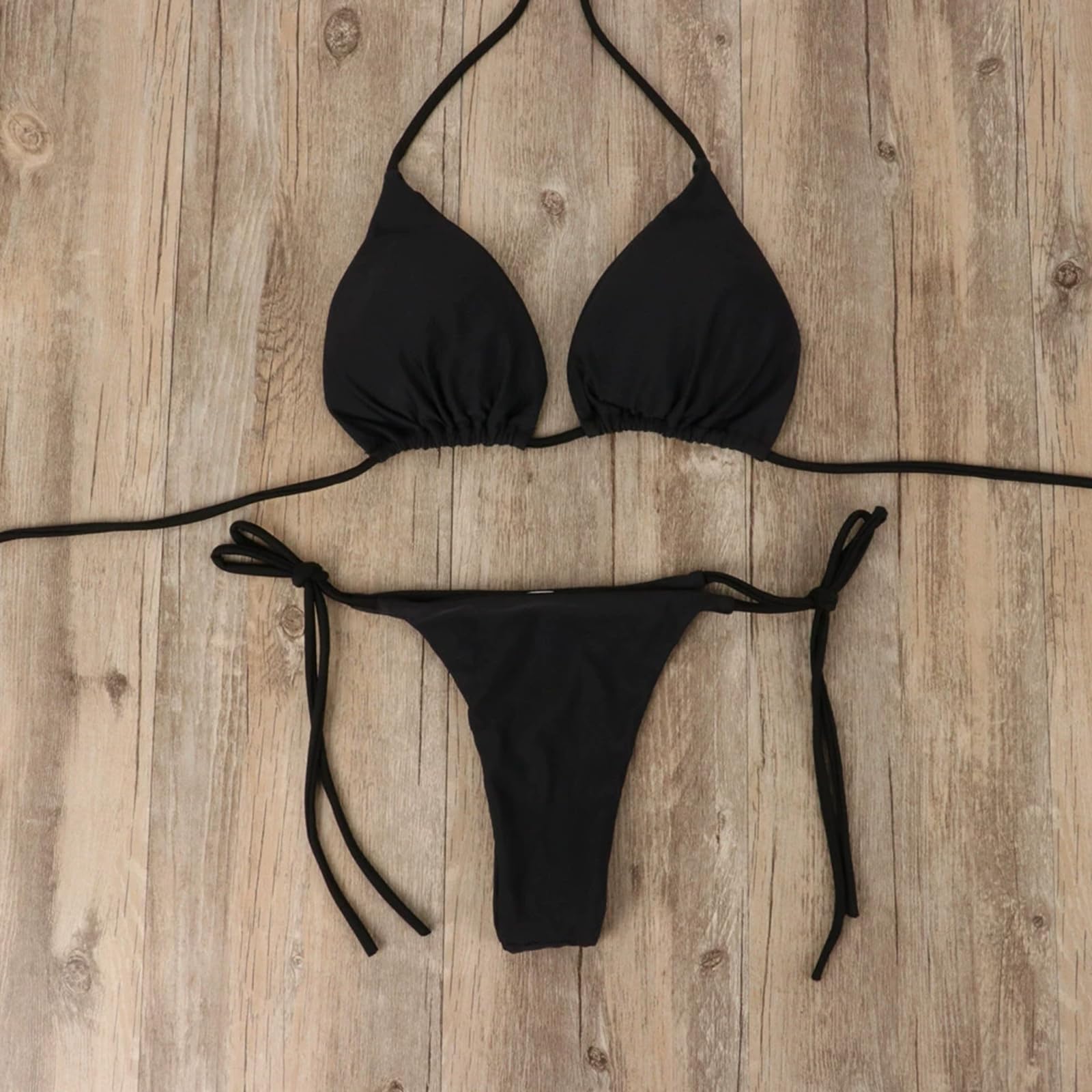 Premium Fabric for Performance, Luxury Crafted from high-performance, luxurious fabric, this bikini set is built to endure. The chlorine-resistant and fade-resistant material maintains its shape and color even after repeated washes. With UPF 50+ sun protection, it shields your skin from harmful UV rays, making it perfect for extended sun exposure. The soft, premium texture feels gentle against your skin, ensuring all-day comfort. Black Two - Piece Triangle Bikini.