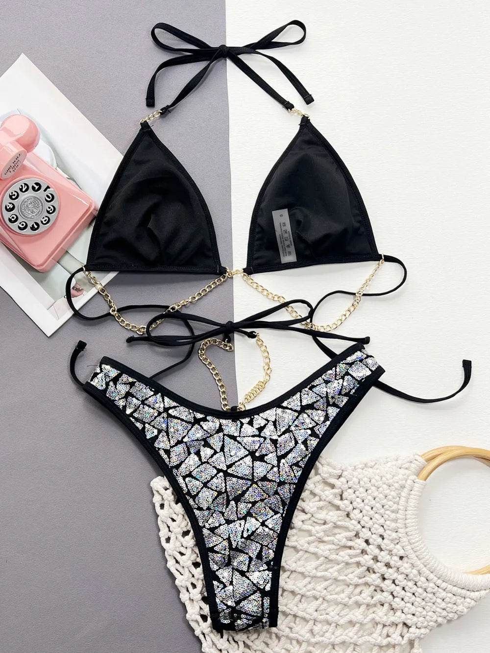 f6a00acd-d21a-437c-817c-edef7f64263c-Max
Features: Sequin
Number of pieces: Two-piece
Chest pad: Removable padding
Underwire: No underwire
Stretch: Slightly stretchy
Material composition: 95% polyester, 5% spandex
Care instructions:
 Machine wash cold. Tumble dry low.
Imported